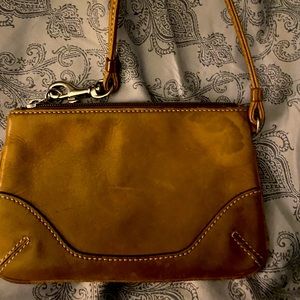 Authentic designer leather wristlet. Very clean.